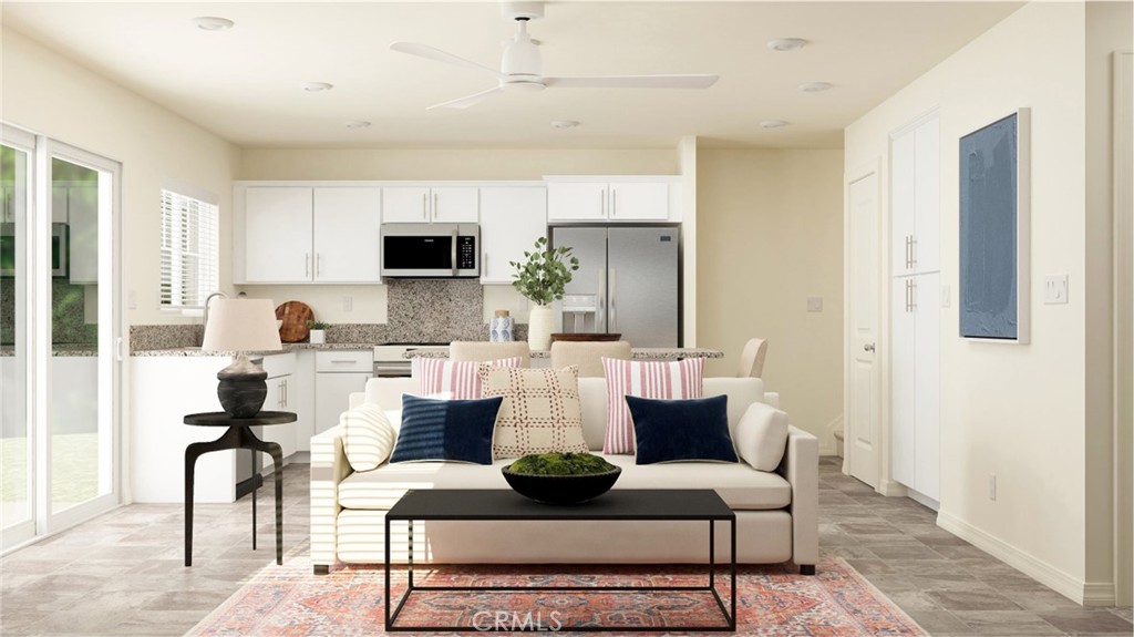 NEW CONSTRUCTION! An inviting Great Room for family gatherings and chef-inspired kitchen can be found on the first floor of this two-story home. There are three bedrooms located upstairs, including the luxe owner’s suite, which includes a restful bedroom, en-suite bathroom and generous walk-in closet.
The Gardens is a new collection of upscale townhomes for sale coming soon to the Highgrove Town Center master-planned community in Highgrove, CA. Residents enjoy prime amenities within the community such as social clubhouse, sparkling swimming pool, barbecue areas, tot lot and more. For local outdoor recreation, Box Springs Mountain Reserve Park features trails for hiking, mountain biking and horseback riding. Shopping and dining options at Downtown Riverside and the Mission Inn are just a 10-minute drive, while UCR is even less and nearby K-12 schools are less than three minutes away.