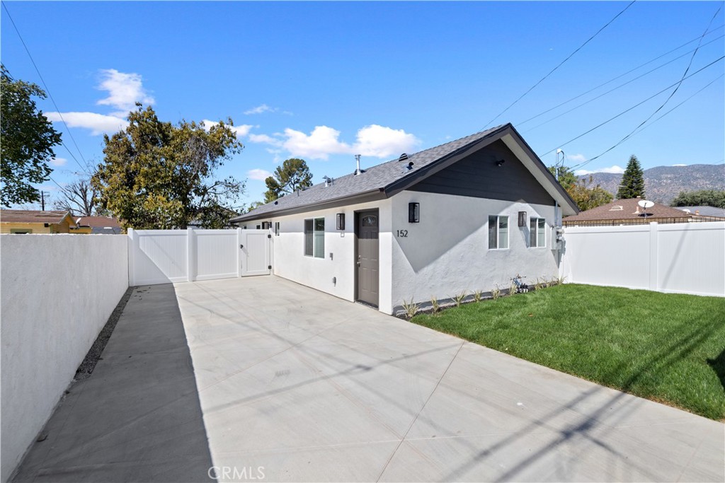 Owner pays water, trash, and gardener. Walk to downtown Glendora shops and restaurants from this brand new 2-bedroom 2 bathroom detached home. Enjoy open concept living and a beautiful new kitchen with large center island and all brand-new appliances. New AC and heater, new tankless water heater. Home features quartz counters in bathrooms and kitchen, laminate flooring throughout, new blinds. Private back yard with large producing avocado tree. Home features a stackable washer and dryer in unit. Landlord pays for water, trash, and gardener. Pets are OK but approval required please submit with application. Front entrance is located in the alley off of Carol. Parking in driveway or on Carol do not park in the alley.