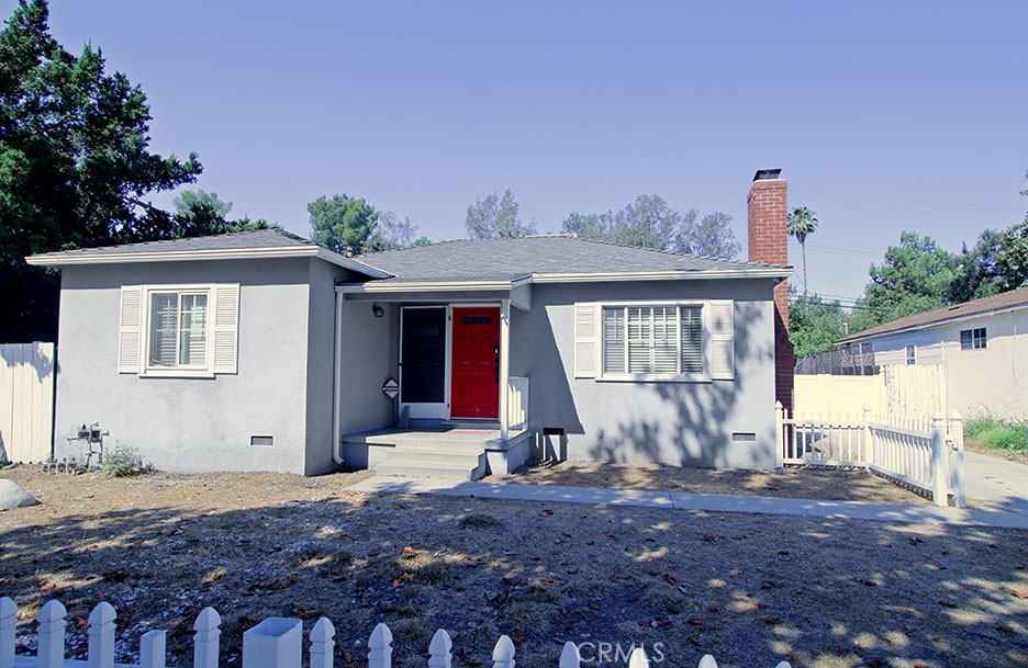 This beautifully upgraded "Farmhouse Style" home with its quaint white picket fence is located in a nice pocket of the North Sherman Oaks/Van Nuys area. It’s just one street West of the famous “Cameron Woods” where they’ve filmed many renown TV shows. Here are just a few of its many other fine features: Its open light and bright floor plan was remodeled two years ago which included fresh interior paint, remodeled kitchen and bathrooms, crown molding, recessed lighting, Closet World® closets, and plantation shutters throughout * You’ll enter into the nice size living room with its beautifully mantled wood-burning fireplace with custom finished hearth * Enter into the formal/dining area * The kitchen has everything new: Cast Iron farmhouse sink, brand new stainless steel appliances, wine rack, ample quartz counters, abundant cabinets with Lazy Susan and self-closing drawers * A total of 3 bedrooms; The grand suite is huge with a beautifully appointed full bathroom, a walk-in closet, and engineered hardwood floor * A total of 2 Full bathrooms * Convenient indoor laundry area off the kitchen with pantry * Nice size linen closet in hallway * The other areas have the nice original hardwood floors * Energy efficient dual pane windows * Central air and heat for year-round comfort * Detached two car garage with garage door opener, it’s perfect for someone who would like to put in an ADU * This is a beautiful house that any buyer “Will Love,” Call now for all the details and I’ll gladly arrange your private showing.