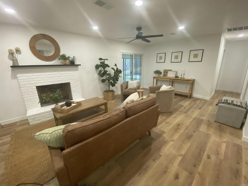 Move-in ready! Perfect for multi-gen living, rental income, or simply enjoying as a stylish family home. This bright and beautifully remodeled 4B / 3B home features an open-concept floor plan, two primary suites with ensuite baths, and a new AC system. The layout offers easy flexibility — live in it as-is or convert part of the home into a separate apartment/ADU. Outdoors, the 0.57-acre lot provides plenty of space for gatherings, optional RV parking, and potential for an additional ADU or even a lot split. Mature and lush landscaping create a private, garden-like retreat. Sewer and water are already connected.