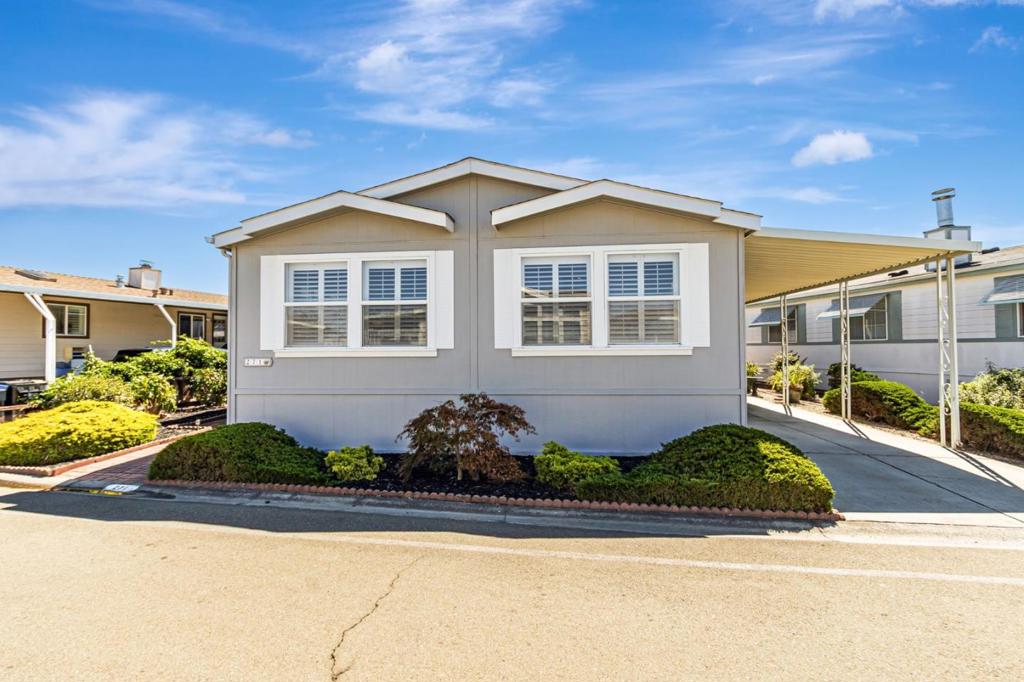 Welcome to this one-owner, well-cared-for manufactured home in the highly sought-after Plaza del Rey community. Lovingly maintained and thoughtfully updated over the years, this residence offers comfort, style, and modern convenience. Step inside through the inviting foyer entry into a bright and open living room, enhanced by upgraded plantation shutters on every window. The spacious kitchen features a cozy breakfast nook, generous counter space, and pantry cabinets. The home is equipped with all appliances, including a washer and dryer & air conditioner. Enjoy outdoor living on the large covered side porch, low-maintenance landscaping. Additional highlights include a large driveway and one of the biggest outdoor storage sheds in the community. Situated near guest parking and close to the front of the community, this home combines convenience with privacy. Residents enjoy resort-style living with access to three swimming pools, a welcoming clubhouse, game rooms, and a state-of-the-art fitness center. Perfectly located just minutes from shopping centers, dining, and entertainment, including movie theaters and Levis Stadium. Commuters will appreciate the easy access to Highways 101, 237, 85, light rail & proximity to major high-tech companies. Space rent to new owners $1,805/mo.