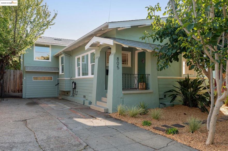Classic Edwardian urban oasis with a luscious garden in North Oakland's Santa Fe neighborhood. This 3-bedroom, 1-bath home boasts old-world rustic charm, offering private spaces for every household member. The well-appointed kitchen features stylish tile floors, stone counters, and access to laundry and a bonus space. The dining and living rooms exude an old-world ambiance and a refined stone fireplace reminiscent of the period. The dining room also has a repainted built-in cabinet and windows overlooking the front yard. The three bedrooms are generously sized with ample closet space. A bonus room with heating and abundant light makes for a delightful home office. The large private garden offers plenty of room to entertain, enjoy the sun, plant, or capture new landscaping ideas. A car charger is on-site. An excellent indoor/outdoor lifestyle. The neighborhood is well-maintained with pride and charm, minutes away from community amenities. Enjoy College Ave fares in Rockridge and Claremont, Emeryville and Temescal eateries and shopping, and Sweet Adeline Bakery, Lois the Pie Queen, Cafe Colucci, and San Pablo Ave fun. Dover and Bushrod Park, and Ashby BART are also nearby. This house is in the heart of North Oakland. First Sunday Open House is 10/12 2-4