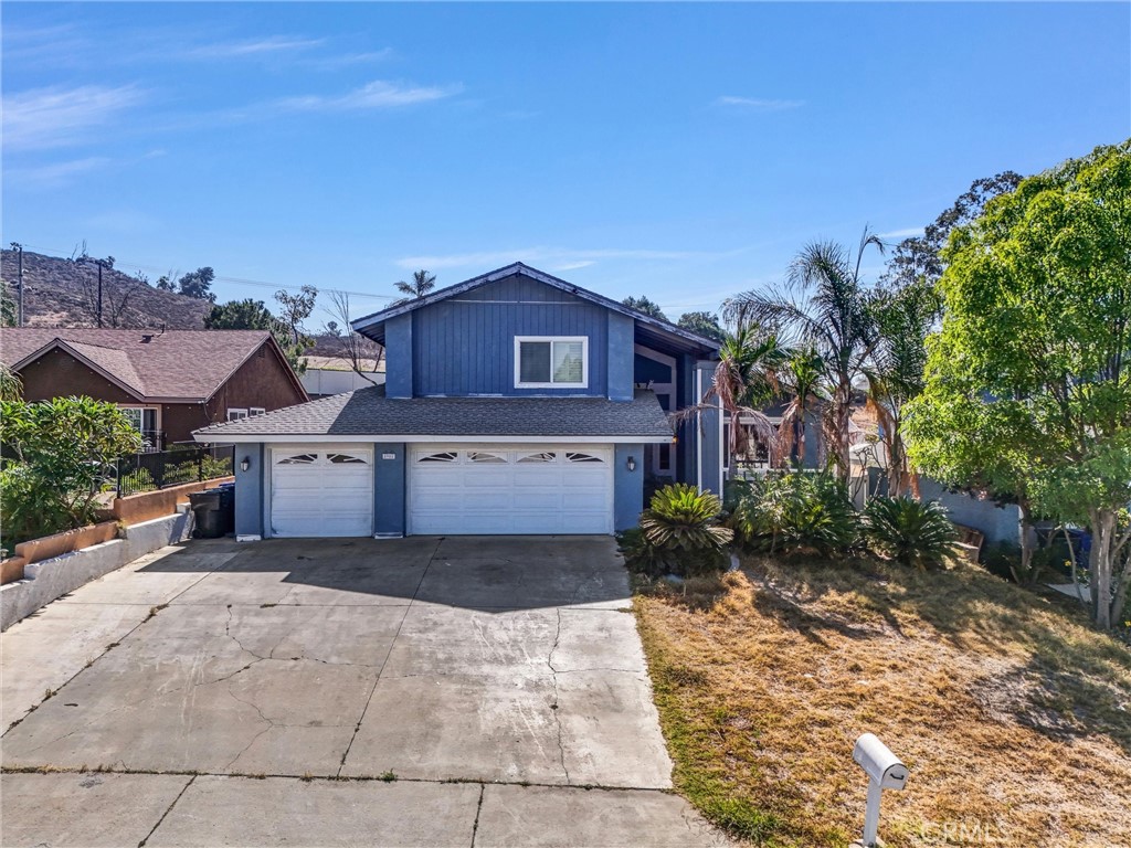 Lovely 2-story Single Family Residential located in a highly desirable area in Jurupa Valley, Riverside County. The home is designed as contemporary style, 4 bedrooms, 4 bathrooms. Expansive living room and sunken dining room, lot area 11,751 Sq ft, gross area 3,178 Sq ft, building Sq ft 2,440. Two primary bedrooms featured with ensuites and oversized closets, one primary bedroom is located downstairs and others upstairs, 3 full bathrooms and 1 half bathroom; built in bar, two great rooms, providing capacious spaces for family gathering and entertainment. The kitchen featured an openness style, vaulted ceiling and roomy space. Three garage spaces and an oversized driveway can easily accommodate several cars parking. Property features solar panels and provides significant energy cost savings. Huge backyard. The home is close to shopping, restaurants, schools, post office, freeways and much more! The property is located at a very safe and friendly community. Come and check this gorgeous home today!