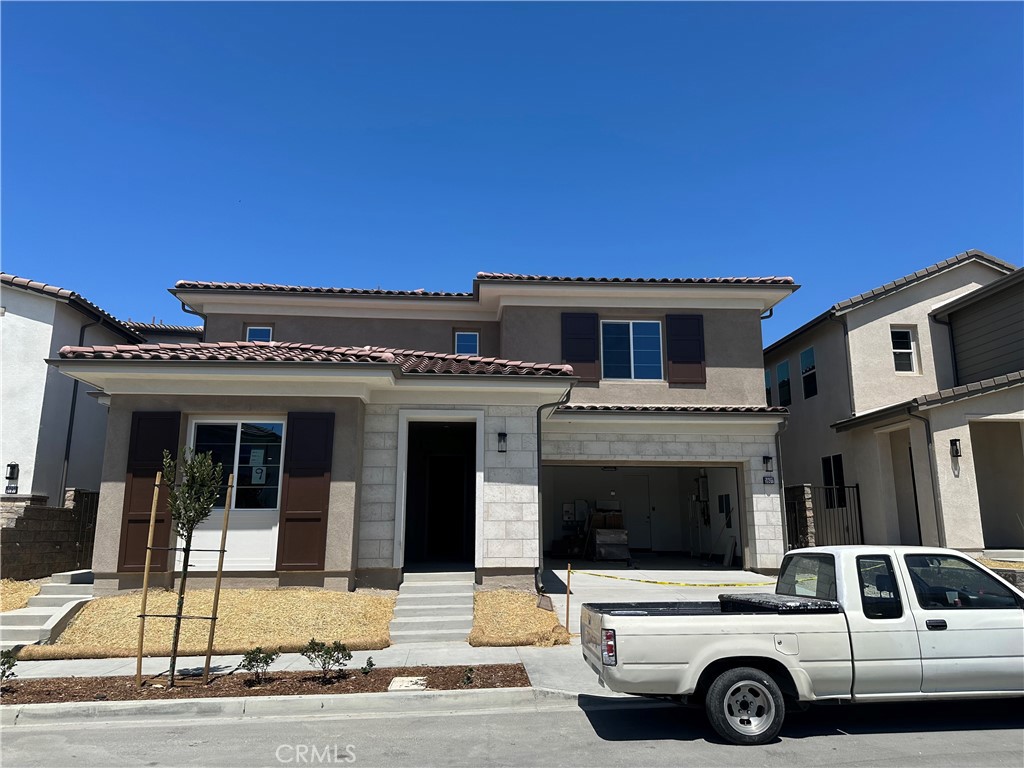 New construction home in The Oaks at Portola Hills. This Beautiful Residence 5530 home is representative of modern California living. Desirable two story with plenty of interior space to entertain. This floorplan boasts 5 well sized Bedrooms, 5 1/2 baths and a 2 Car Garage. The primary bedroom features an open concept with a sitting area to unwind. Interior includes an accessory unit ILO of bedroom 2 and highly tastefully upgraded flooring, countertops, wall tile, cabinet, stair and electrical. A beautifully appointed California room leads you to your private backyard. It’s Indoor and outdoor living at its best. Access to hiking trails and outdoor activities abound including a dog parks and sports park. Gated community with a swimming pool, BBQ area, and C Multi-paneled doors clubhouse. Near 241 Toll Road and Irvine Spectrum.