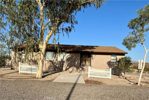 Photo of 99 Zoe Lane, Needles, CA 92363 (MLS # JT25191070)