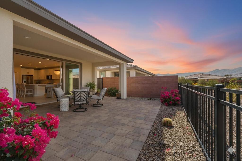 Experience the pinnacle of active 55+ desert living in this turn-key, nearly-new Valetta floorplan at Trilogy at The Polo Club. This home is designed for the discerning individual seeking a seamless fusion of contemporary elegance, effortless single-level living, and a vibrant social calendar. The open-concept design immediately captures attention, flowing into a state-of-the-art gourmet kitchen defined by a Quartz slab center island, sleek soft-close hardware, and a high-end KitchenAid stainless steel appliance package. The layout is enhanced by a versatile den/bonus room and a luxurious Primary Suite, while the West-facing patio frames stunning mountain views--perfect for evening relaxation. The home is equipped with a fully-paid-for solar system, providing immediate and substantial long-term utility savings. Best of all, a highly desirable Club Membership is available for transfer to the new owner, granting exclusive and immediate access to Trilogy's world-class resort amenities, including the fitness center, pools, and on-site restaurant, ensuring a life of connection and convenience. Showings begin October 17th.