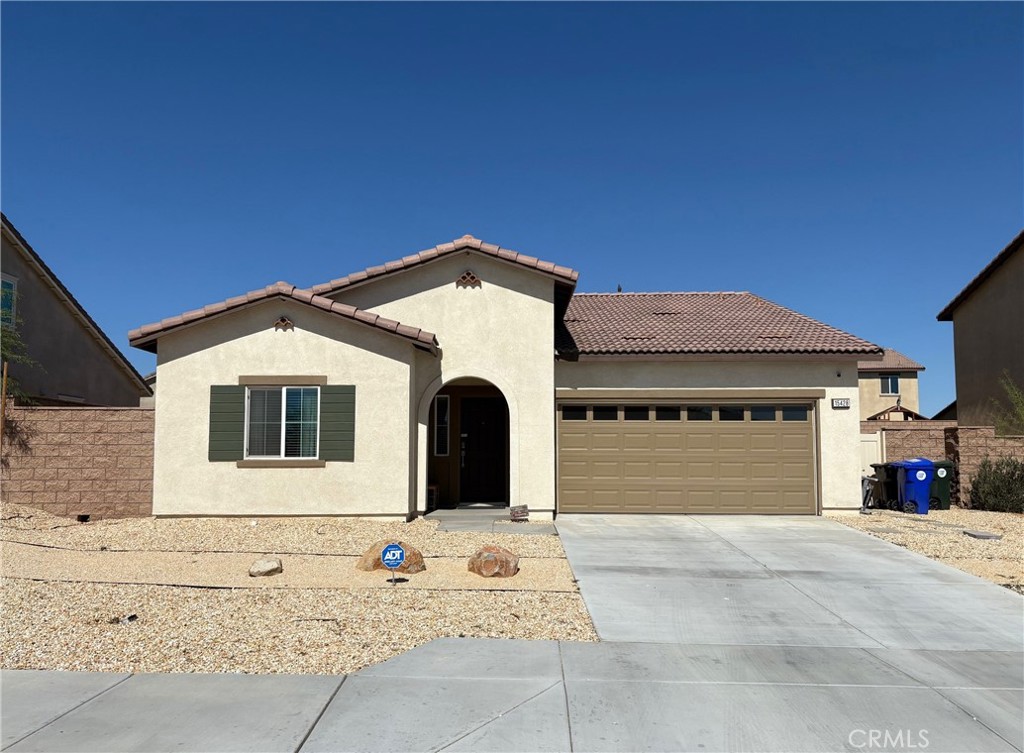 Welcome to 15428 San Francisco Ln — a move-in ready SMART home located in the quiet and established Santolina by DR Horton community in Victorville! This charming single-story home features 3 spacious bedrooms, 2 full bathrooms, upgraded flooring and an open-concept layout perfect for everyday living and entertaining. The well-designed floor plan offers a bright and airy living room, a spacious kitchen with plenty of cabinetry, upgraded stone cooktop, and a dedicated dining area ideal for meals and gatherings. Best of all, the solar panels are PAID OFF! Enjoy a generously sized backyard with extra concrete finished($8,000 paid.) perfect for hosting BBQs, letting pets roam, or simply relaxing under the High Desert skies. The primary suite offers privacy and comfort with Master bathroom and ample closet space. Additional highlights include a 2-car attached garage, interior laundry area, and central heating and air. Located just minutes from shopping centers, schools, parks, and quick freeway access to the 15, this home is ideal for commuters and growing households alike. Don’t miss this opportunity to own a beautiful home with room to grow in the heart of Victorville. Schedule your private tour today before it’s gone!