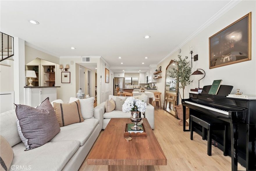 Welcome to this stunning tri-level townhome in the highly sought-after South-of-the-Boulevard Sherman Oaks neighborhood. Designed for modern living, the home blends comfort, style, and convenience in a turnkey package.  The main level features a bright, open floor plan with a spacious living room and entertainer’s bar flowing into a chef’s kitchen with granite countertops, stainless steel appliances, and a center island. Upstairs, two large primary bedrooms each offer a private en-suite bath and walk-in closet. The lower level includes direct garage access and a versatile bonus room, ideal for a gym, office, or playroom.  Smart-home features include dimmable lighting, Alexa-controlled shades, and a smart thermostat. Community amenities include a secluded pool, central courtyard, and bike storage. With a Walk Score of 84, this home is just steps from Whole Foods and Ventura Boulevard’s dining and shopping, with quick access to the 405, 101, and Beverly Glen for an easy Westside commute. Don't let this one get away!