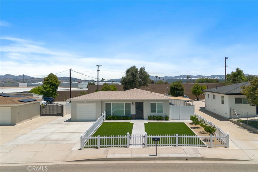 FULLY REMODELED AND LOOKS LIKE A NEW CONSTRUCTION HOME! This commuter-friendly home sits on a HUGE 9,148 sq.ft. lot that allows for vehicle access into the backyard. It features 3 bedrooms & 2 baths all on a single level. The new kitchen features white shaker cabinets with soft-close doors/drawers, quartz countertops, single-basin stainless steel sink, new GE appliances: modern stove, microwave & dishwasher. Both bathrooms have new showers, new vanities, quality Moen fixtures and Kohler toilets. Low maintenance luxury vinyl plank flooring throughout, new baseboards and doors. Newer energy efficient Central Heating & A/C, water heater, roof, plumbing, sewer line, electrical panel & LED LIGHTING THROUGHOUT. Inside laundry hook-ups. Backyard has TWO covered patios, variety of fruit trees and ample room for RV parking, work trucks, etc. Lots of room for entertaining. The front yard is gated and has low maintenance artificial turf with citrus trees. Limited landscaping service is included in the rent. A house in this condition will go very fast. Landlord looking for tenants with FICO's ideally above 620, income that is at least 2.5 times the rent, no evictions. Pets will be considered upon submittal. Ready for immediate move-in.