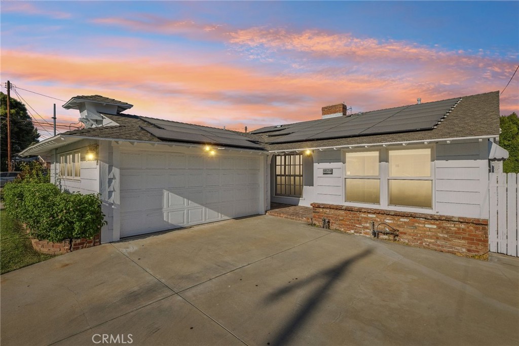 Welcome to this charming 4-bedroom, 2-bath ranch-style home in one of the most coveted areas of LAUSD, within the boundaries of the acclaimed Granada Hills Charter High School. With 1,802 sq ft of living space on a 6,776 sq ft lot, this residence blends timeless character with modern updates and endless potential.
Freshly painted interiors are complemented by new carpet in the back bedroom and refinished hardwood floors in the living and bonus areas. The spacious living room features vaulted, beamed ceilings, richly wood-paneled walls, and a distinctive fireplace with built-in features that exude warmth and comfort.
Just beyond, a generous bonus den offers ideal space for entertaining, a playroom, or a home office. The galley-style kitchen is bright and functional, with a window overlooking the yard and easy access to the adjacent laundry area.
One of the home’s standout features is the converted garage, previously used as a sound-insulated music studio, complete with laminate flooring, a box AC unit, and a whimsical dovecote detail on the roofline — blending form and function.
Additional upgrades include a new HVAC system and owned solar panels, fully paid off for maximum energy efficiency. The spacious driveway and front yard provide ample room for expansion, ADU potential, or additional parking.
Special Financing Available: Lock in a rate up to 1% below market (currently under 6%), with 0% down, no mortgage insurance, no lender fees, and up to $6,500 in credits, and it’s not income-restricted!
This home offers charm, flexibility, and a prime location, making it perfect for families, creatives, or investors looking to personalize a property with great bones in a top-tier school district.