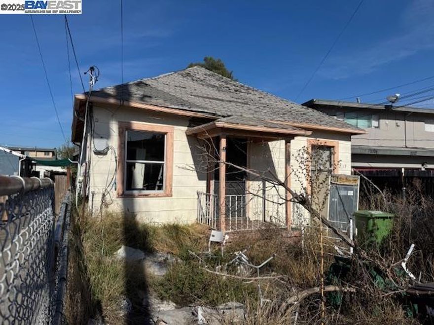 Two 2 bedroom/1 bath houses on one lot - each with separate addresses.  Both homes require extensive work, and the price is reflective of that.