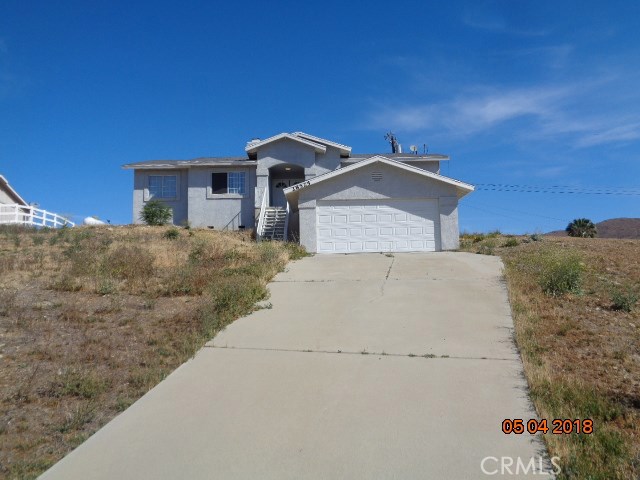 Charming 3-Bedroom Home in Tranquil Menifee Setting! Don’t miss this wonderful opportunity to lease a well-appointed 3-bedroom, 2-bathroom home nestled in a peaceful, rural area of Menifee. Enjoy the perfect blend of comfort, charm, and scenic surroundings. Property Highlights: Beautiful wood-look flooring throughout the main living areas. Cozy fireplace in the spacious family room, perfect for relaxing evenings. Bright and functional kitchen with ample cabinet and counter space. Primary suite features a private balcony with stunning hill views, an en-suite bathroom, and a large walk-in closet. Ceiling fans for added comfort. Generous 2-car garage offering plenty of storage space. Located in a serene neighborhood with easy access to major roads, shopping, and dining — this home offers a relaxing lifestyle while still being conveniently located. Pets considered on a case-by-case basis
Renter’s insurance required with a $300,000 liability policy. Hurry – this gem won’t last long!