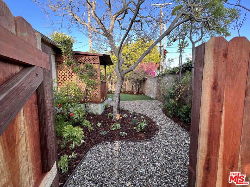 Beautifully Remodeled 2-Bedroom Unit in Westchester with large private yard! Step into this tastefully renovated two-bedroom home featuring a fresh, modern design and thoughtful upgrades throughout. Enjoy the convenience of in-unit laundry, newer HVAC system and kitchen appliances. The home also boasts new triple -glazed windows, new doors, a fresh air circulation system, and refinished hardwood floors that add timeless charm. The light-filled living and dining areas offer a spacious, open layout that flows effortlessly. The bright kitchen comes fully equipped with a refrigerator, stove, and a dedicated laundry area. Both bedrooms come with ample closet space. Outside, relax or entertain on your private patio terrace, or enjoy your beautifully landscaped yard. Ideally located just minutes from Playa del Rey, Playa Vista, and Culver City, this property offers both comfort and convenience in a highly desirable neighborhood. Small dog or cat is okay. Contact Thomas to schedule a showing.