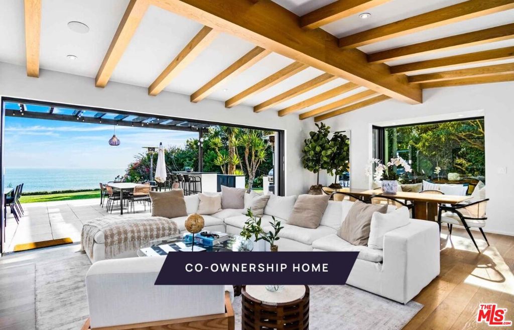 New co-ownership opportunity: Own one-eighth of this professionally managed, turnkey home by Pacaso. Cool, casual and contemporary, this 3-bedroom, 3-bathroom Malibu retreat offers ocean views and indoor/outdoor living at its best.Pocketing Fleetwood glass doors connect the living room with a massive deck. Set against an ocean backdrop, the deck features a BBQ area, fireplace, two fire pits and a spa. A few steps down from the deck is a large grassy lawn and garden, with stunning Pacific vistas.The sleek kitchen has plenty of counter space, high-end appliances and casual island dining. Just steps away is a more formal dining area facing the garden.Folding glass doors in the generous primary suite lead to the deck and ocean views. The crisp en suite bathroom has a relaxing soaking tub and tiled shower. Two more bedrooms and a bathroom complete the main floor. The lower level consists of a laundry room and a studio suite with a three-quarter bathroom.The home comes fully furnished and professionally decorated.