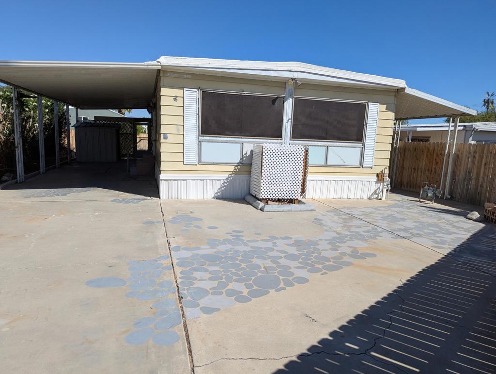 Start planning your Snowbird dreams with this 2BD/2BA charmer. Owning the land is part of what makes this Community stand out. Newer AC is a plus. Also, the huge front yard is perfect for RV parking and the yard is fenced. Lots of room for a garden. DCCC has wonderful amenities including a par three golf course, hot mineral water pools, sauna and small gym area, etc. The Club dues are tied to the cost of living and right now are 148 per mo.