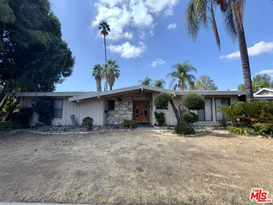 Welcome to the first offering of 4711 Deseret Drive, an original Charles DuBois! This single-story mid-century home is perfectly nestled south of Ventura Blvd and is ready to be reimagined. With over 2500 SqFt, the three bedroom home enjoys two expansive primary bedrooms with en-suite bathrooms, a third bedroom, and a summer day room with easy access to the pool. Vaulted ceilings and a stone fireplace compliment the expansive living room that opens up to the patio and back yard. Ready to be re-designed as an outdoor oasis, the home enjoys lush mature greenery and a pool in the private backyard. With an eye for design this house is ready to become a dream home in the perfect location of Woodland Hills, just a walk away from Calabash elementary school and minutes from Calabasas Commons. Note: Square footage does not include summer room or garage being used as an office. Property is in disrepair and is occupied. Personal property at home may cause tripping hazards and limits access. Seller is in transition period. Proceed with caution. Seller is a California Real Estate Broker.