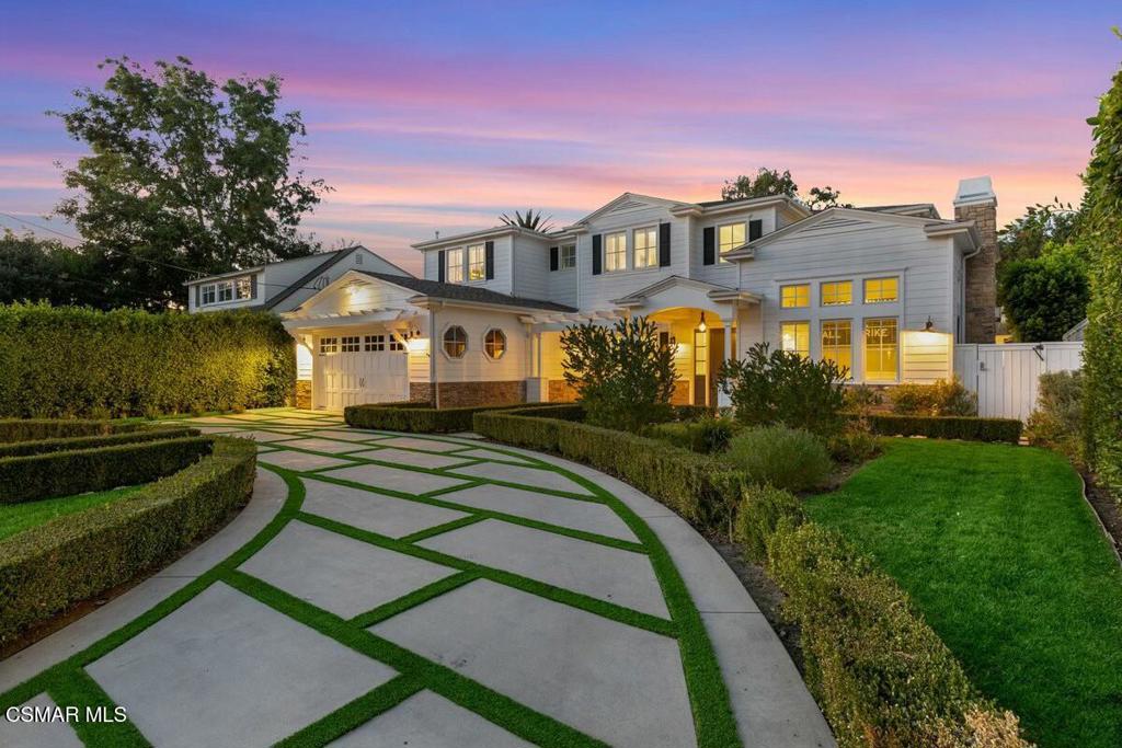 The HOME, Yard, Lot and Street you have Been waiting for! Discover the extraordinary scale, grandeur, and captivating charm of this distinctive two-story residence on one of Colfax Meadows' most coveted streets. Spanning over 6,100 square feet and set on an expansive 15,757 square foot lot, this immaculate gated home offers a luxurious lifestyle designed for the most discerning buyer. Featuring 5 en-suite bedrooms, 6 bathrooms, a dedicated home office suite, and an impressive home theater, this property is equipped with many amenities. Enjoy the Control 4 smart home system(installed 2014 but never used by owners), security cameras, and an AquaLink wireless remote for effortless management of the saltwater pool and spa, complete with a pool heater.The residence showcases soaring ceilings, an open-concept floor plan, and a seamless indoor-outdoor flow that embodies style and sophistication. Enter through dual secured gates into a private courtyard featuring a motor court for up to five cars, an oversized two-car garage, and a circular driveway. The chef's kitchen, a dream for entertainers, boasts Caesarstone countertops, two sinks, dual dishwashers, and an expansive Calacatta marble island with an integrated ice maker. Outfitted with stainless steel Viking appliances, a Sub-Zero refrigerator, and two additional fridge drawers, this kitchen overlooks the breakfast nook and family room, which open to the patio through bi-fold doors. Outside, relax in the poolside gazebo complete with a fireplace, TV setup, BBQ, outdoor sink, fridge, and bar, all ideal for Southern California's outdoor lifestyle.The home theater offers a cozy retreat with a projector, eight plush reclining chairs, and space for additional seating. For wine enthusiasts, a temperature-controlled and secure wine storage area awaits. The breathtaking primary suite, where double doors open to a serene space with two walk-in closets, a spa-inspired bathroom with dual sinks, and a glass steam shower, all overlooking the tranquil yard and pool area.Additional features surround sound throughout the home, and ceiling speakers in key rooms, including the media room, family room, and master suite. Located in the highly regarded Carpenter School District and close to upscale dining and shopping, this home is a rare find that must be experienced in person to appreciate its full allure.