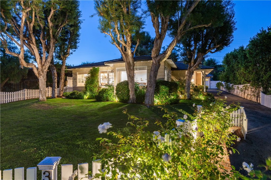 WATCH VIDEO! Welcome to this Signature Valmonte Ranch Home — a rare blend of elegance, comfort, and coastal charm. Perched gracefully above the street, this stunning residence is framed by a classic white picket fence, blooming white rose bushes, and towering eucalyptus trees, offering both privacy and a picturesque setting. Step inside to discover a beautifully remodeled Chef’s Kitchen—the heart of the home—featuring a generous island, premium Wolf appliance package, Sub-Zero refrigerator, wine fridge, and a built-in Miele coffee maker. Whether you're hosting or enjoying quiet mornings, this kitchen offers the perfect blend of luxury and function. Large picture windows flood the interior with natural light and showcase sweeping views of the renowned walking trail that winds through the neighborhood, enhancing the home’s serene and community-focused ambiance. Thoughtful upgrades continue throughout, including elegant wainscoting, enhancing the home’s sophisticated character. The Primary Bedroom enjoys an Ensuite Bath and French Doors to the backyard providing an easy escape to the Spa Retreat. Outdoors, enjoy two distinct entertaining spaces:
Front yard: Fully enclosed with a gated driveway, the expanded front lot offers a secure, spacious play area for kids and pets. Backyard retreat: Designed for entertaining with a full outdoor kitchen, spa, firepit, and plasma TV area—ideal for relaxing evenings or lively gatherings. All this while enjoying close proximity to; PV golf course, PV Horse Stables, PV Beach & Athletic Club, Malaga Cove Plaza, Pristine Beaches, Hollywood Riviera restaurants & shops + coveted award winning PVPUSD (Palos Verdes Peninsula Unified School District)! This is more than a home—it’s a lifestyle. Come experience the best of Valmonte living!