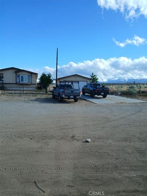 Photo of 10075 Dos Palmas Road, Victorville, CA 92392 (MLS # HD26102511)