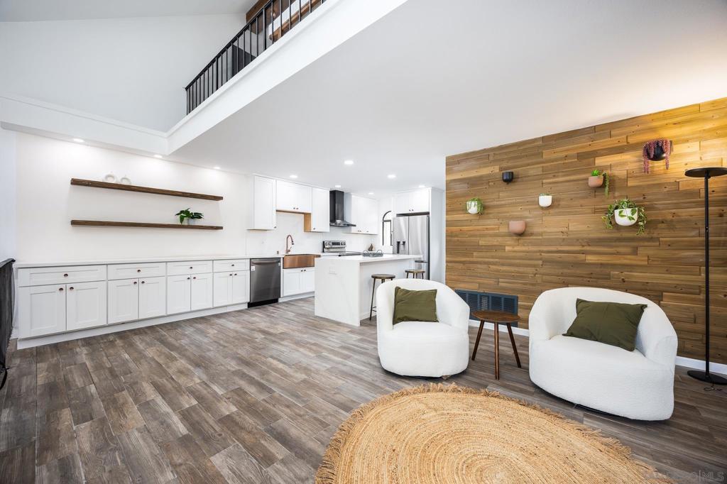 Rarely Available Bankers Hill Gem with Bay Views and Vaulted Ceilings! This beautifully updated 2 bed, 2.5 bath condo with a spacious loft is tucked away on a quiet street in one of San Diego’s most desirable neighborhoods. Inside, you'll find a brand-new remodeled kitchen featuring modern finishes, sleek cabinetry, and top-of-the-line appliances, perfect for everyday living or entertaining. The high vaulted ceilings, large windows, and skylights flood the living space with natural light. The open layout feels bright and airy, and the loft offers great flexibility as a potential third bedroom, office, or game room. With no upstairs neighbors, you’ll enjoy peace, privacy, and quiet comfort. Enjoy two private balconies, perfect for relaxing or taking in the bay breeze, as well as the convenience of in-unit laundry. Located in a well-maintained 6-unit complex, this home offers peace of mind, low-maintenance living, and fewer headaches than larger communities. Includes two parking spots in a gated parking structure. Minutes from Balboa Park, Little Italy, Downtown, and the airport, this is Bankers Hill living at its best.