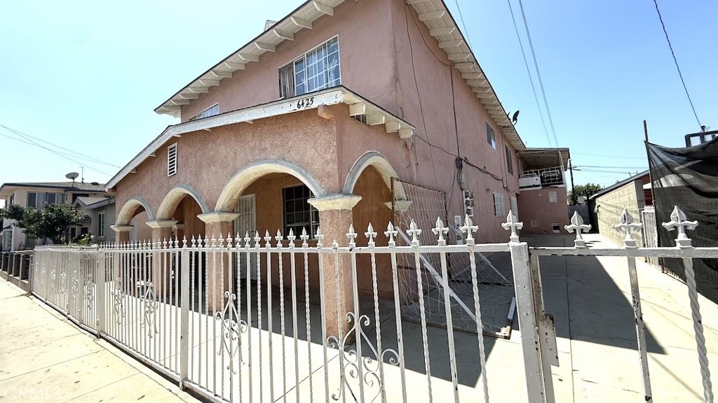 Amazing opportunity to either invest or live in one of the units, this 4 plex features, front unit : 2 story- 2 bedroom 1.5 bath in front unit, rear unit single story 2 bedroom 1bath, Upper level has 2 units one level, each are 2 bedroom and 1 bath, one of those units is currently vacant, this complex has parking in rear has garage and parking in fenced area, and there is a designated area for laundry right outside of building, this property is near schools and shopping and freeways.
