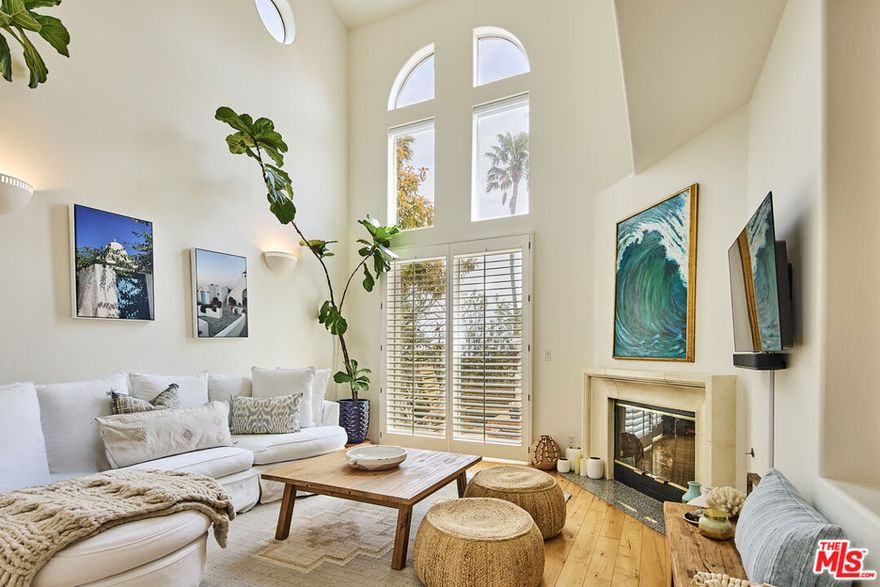 Refined Coastal Living at The Pointe in Malibu! Welcome to The Pointe, one of Malibu's most desirable gated communities, where modern comfort meets timeless coastal charm. This beautifully appointed, light-filled townhome embodies the essence of refined Malibu living, offering a harmonious blend of style, functionality, and tranquility just minutes from local beaches, dining, schools, and lifestyle destinations. Step inside to an inviting open-concept living area featuring hardwood floors, vaulted ceilings, and a cozy fireplace that creates a relaxed sense of coastal elegance. Sliding glass doors open to a private patio  a perfect spot for morning coffee or evening unwinding beneath Malibu's golden skies. The chef-inspired kitchen is designed for both everyday living and effortless entertaining, complete with granite countertops and premium stainless-steel appliances. Upstairs, two spacious en-suite bedrooms offer peaceful retreats with full baths that include both stand-up showers and jetted soaking tubs. The primary suite enjoys gentle ocean glimpses, generous closet space, and a spa-like bathroom with dual sinks, and a jacuzzi tub for ultimate relaxation. New designer flooring throughout the upper level enhances the home's fresh, modern aesthetic. Additional highlights include central air conditioning, in-unit laundry, and a two-car garage with EV charging capability. Residents of The Pointe enjoy resort-style amenities including a heated pool, spa, lighted tennis and pickleball court, a half basketball court, and a fully equipped fitness center. Conveniently located near Point Dume, Zuma Beach, and Westward Beach  with easy access to Malibu's top markets, boutiques, and restaurants  this home captures the effortless sophistication of Malibu coastal living.