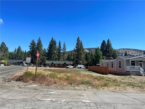 Photo of 900 Greenway Drive, Big Bear City, CA 92314 (MLS # IG26072051)