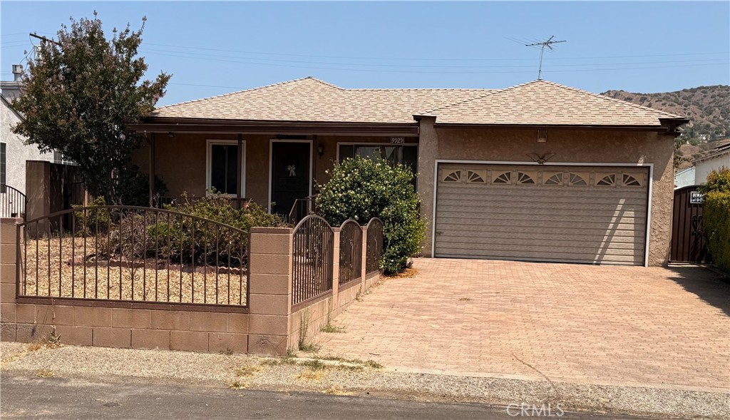 This charming home is located in a well established neighborhood with easy access to schools, restaurants, shopping, major freeways and the Burbank Airport all in close proximity. This home features new carpet in the living, dining, family rooms and the hallways, an upgraded central AC/Heating system with a NEST thermostat. The kitchen design offers plenty of counter and cabinet space and looks out over the huge back patio with an outside gas-line hookup and the large backyard area with two storage buildings and a mature lemon tree. The home offers two large size bedrooms with two bathrooms one in hallway and a master-bathroom. The laundry area is nicely positioned in the garage. The front-yard has low maintenance and designed with drought resistant landscaping.