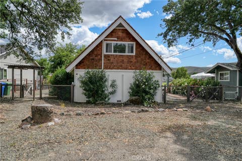 Photo of 18775 Hidden Valley Road, Hidden Valley Lake, CA 95467 (MLS # LC26112941)