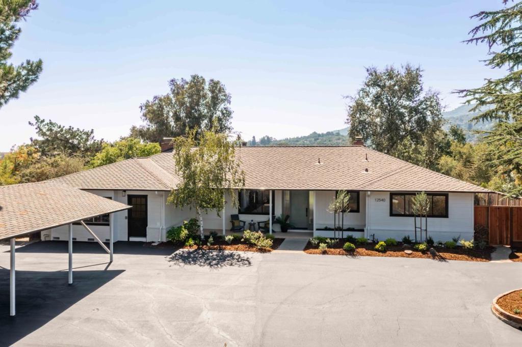 Set on a 1.09-acre lot, this fully updated home offers modern comfort and style. Interiors feature all-new luxury vinyl tile flooring, fresh paint, two fireplaces, and a wall of glass in the living/dining room that brings the outdoors in. The kitchen has freshly painted cabinets, new quartz counters, a new sink and fixtures, and stainless-steel appliances, while bathrooms have been completely updated. A large flexible room and three spacious bedrooms provide versatility, and the backyard offers a patio, lawn, and newly landscaped grounds with a freshly paved driveway. Nearby preserves and trailheads invite exploration, with downtown Los Altos shopping and dining just minutes away. Children may attend Gardner Bullis Elementary, Egan Junior High, and Los Altos High (buyer to verify eligibility).