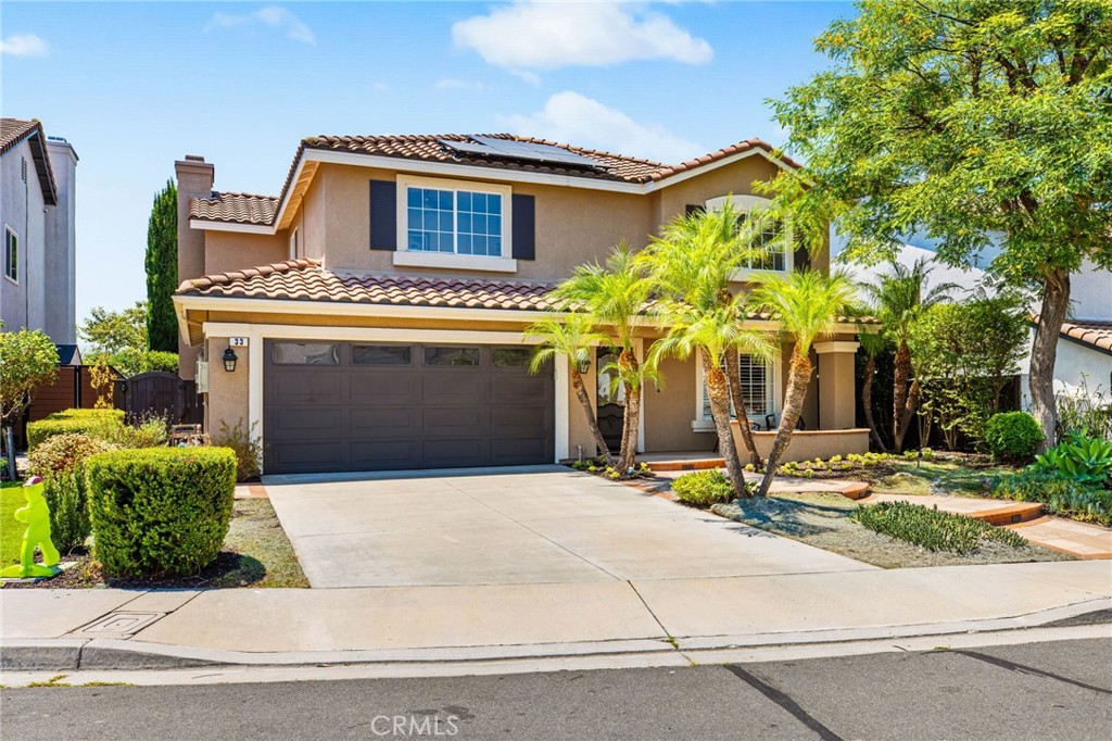 Nestled on a quiet cul-de-sac in the sought-after Melinda Heights neighborhood of Rancho Santa Margarita, this stunning 4-bedroom home delivers the perfect balance of comfort, style and panoramic city views. Step inside to find newly installed luxury vinyl flooring throughout the main level, complementing an open-concept layout that seamlessly connects the spacious family room, dining area, and kitchen. The kitchen offers ample space to cook and gather, featuring a generous walk-in pantry and direct flow into the main living area — ideal for both entertaining and everyday living. Upstairs, you’ll find all four bedrooms, including a spacious primary suite with more breathtaking views, brand-new luxury vinyl flooring in primary bath and an oversized walk-in closet that feels like its own retreat. But the true showstopper? The backyard oasis. Enjoy a beautifully designed pool, a built-in Viking BBQ station, lush green landscaping, and plenty of space to unwind or entertain under the California sun. Additional highlights include paid-off solar, a tankless water heater, and smart energy-efficient upgrades throughout. Located within a community known for highly rated schools, low property taxes, and access to Rancho Santa Margarita’s premier amenities — including four Olympic-sized pools, the sand-bottom Beach Club swim lagoon, catch-and-release lake, scenic trails, sport courts, and more. This is more than a home — it’s a lifestyle. Don't miss your chance to own a slice of Melinda Heights with views, privacy, and features that check every box.