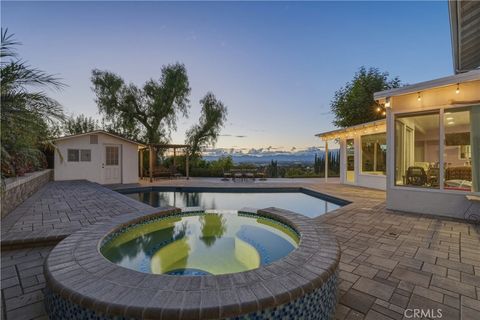 Photo of 17132 Oak View Dr, Encino, CA 91316 (MLS # OC26088800)