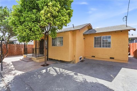Photo of 9603 Holmes Avenue, Los Angeles, CA 90002 (MLS # DW26080718)