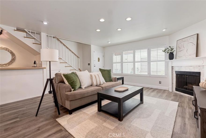Experience the best of Sherman Oaks living in this Prime south of the boulevard townhome. The stylish Light-filled residence features an updated kitchen with high-end stainless-steel appliances, a spacious open concept, living and dining area with a cozy fireplace. Convenience is key with a powder room and laundry on the main level. Retreat to the upper level's two generously sized en-suite bedrooms with walk-in closets. The versatile ground floor bonus room features built in cabinetry and could be a perfect office, gym, or guest quarters. Direct access to a secured garage provides security and convenience for your two side-by-side parking spaces and storage units. Residents can also enjoy the beautiful pool and open patio areas. HOA fees are only $435/month and include EQ insurance. With easy access to the 101 and 405 freeways, this is an ideal home for an easy commute to the westside and beyond.