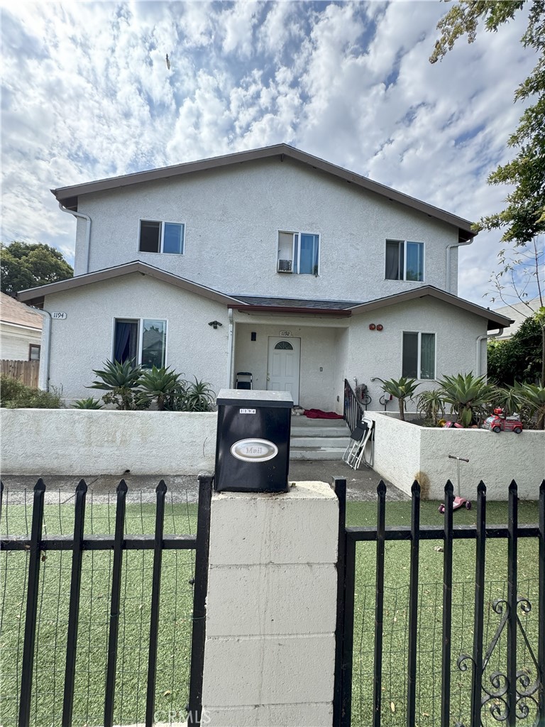 This modern duplex, constructed in 2020 and located in South Los Angeles, comprises two adjacent units. Each unit features five bedrooms, three bathrooms, a kitchen, and a laundry nook. The property is gated, ensuring privacy, and each unit has separate entries, utilities and garages with ample parking space. The neighborhood offers a vibrant community with easy access to local amenities, schools, and public transportation. Nearby attractions include the iconic Los Angeles Memorial Coliseum, the Natural History Museum of Los Angeles County, and Exposition Park. This duplex presents a unique opportunity to reside in one unit while leasing the other, or to lease both units for a consistent income stream. Notables include, 1-car garage and 2-car garage with plenty of additional parking.
