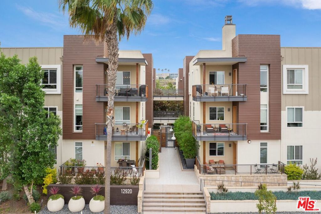 3BR, single-level condo available, located in the heart of Playa Vista & Silicon Beach! One of the prime locations, situated just 1 block from The Resort fitness center & 2 blocks from the new Runway retail center. Single level with 1310 SF living space plus north-facing balcony. Former model home on the 1st level of LEED-certified building (built by KB Home). Spacious, open concept floorplan with plenty of natural light. Ceramic tile and hardwood floor throughout. All appliances included. Full access provided to all fitness, pool, barbecue and community amenities. Cable TV, High-Speed wireless Internet and Home Security Monitoring Service included. Secured, gated building access with 2 assigned parking spaces in subterranean garage. Includes additional storage space in the garage!