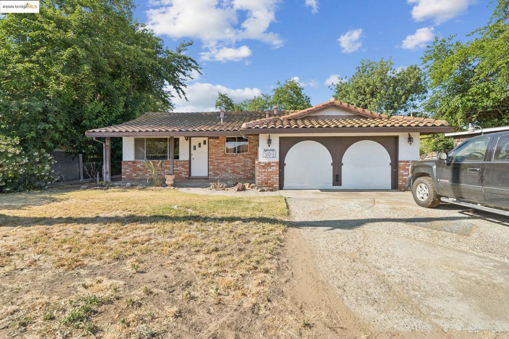 Welcome to 501 De Fremery Drive, a rare opportunity to own nearly half an acre in a rural neighborhood in Brentwood. This property offers plenty of space to bring your vision to life - a garden, pool, or ADU. This home is the perfect canvas for your personal touch. Only a short drive from local schools, parks and shopping. If you're looking for space, potential, and a chance to make it your own this Brentwood gem is waiting for you!