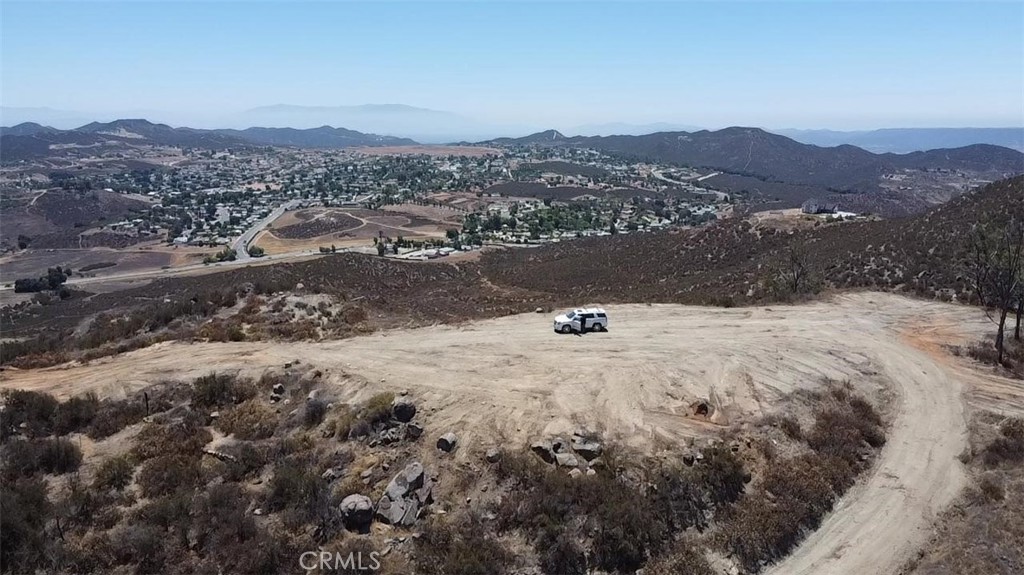 Vacant Land with Utilities & Panoramic Views in Wildomar, CA
Incredible 5.44-acre parcel in Wildomar with panoramic views of Canyon Lake, San Bernardino & San Jacinto Mountains, and Temecula Valley. Utilities in place — includes water meter and septic system sized for a 4-bedroom home. Zoned R-R (Rural Residential), allowing for custom home, guest house, possible agricultural or equestrian use. Just off the 15 Freeway near Crab Hollow Circle. Peaceful, elevated setting yet minutes to shopping, schools, and city amenities. Latitude: 33.618292 | Longitude: -117.255854. Buyer to verify all information with Riverside County. Ready for your dream build!