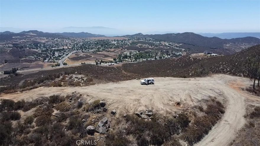 Vacant Land with Utilities & Panoramic Views in Wildomar, CA



Incredible 5.44-acre parcel in Wildomar with panoramic views of Canyon Lake, San Bernardino & San Jacinto Mountains, and Temecula Valley. Utilities in place — includes water meter and septic system sized for a 4-bedroom home. Zoned R-R (Rural Residential), allowing for custom home, guest house, possible agricultural or equestrian use. Just off the 15 Freeway near Crab Hollow Circle. Peaceful, elevated setting yet minutes to shopping, schools, and city amenities. Latitude: 33.618292 | Longitude: -117.255854. Buyer to verify all information with Riverside County. Ready for your dream build!
