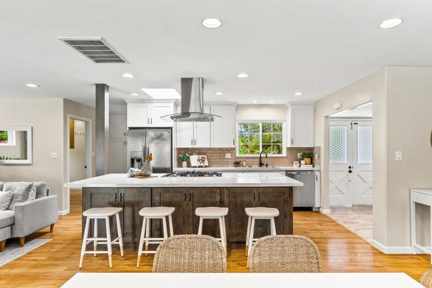 Beautiful, serene, single-level home in the highly desirable Country Club Park neighborhood of Rio del Mar. Set on a spacious lot with a half-circle driveway and inviting curb appeal, this 4 bedroom, 2.5 bath home offers comfort, convenience, and California-style living at its best. Inside, you'll find an ideal open concept layout with generous living spaces, a modern kitchen with a butler's pantry and wine storage, and seamless indoor-outdoor flow. The backyard is a true retreat, featuring privacy, brand new turf, mature landscaping, an inviting pool, and multiple spaces designed for relaxing, dining, and entertaining. Located minutes from beaches, golf, dining, and top-rated schools, this home offers the best of Aptos living in one of its most established neighborhoods.