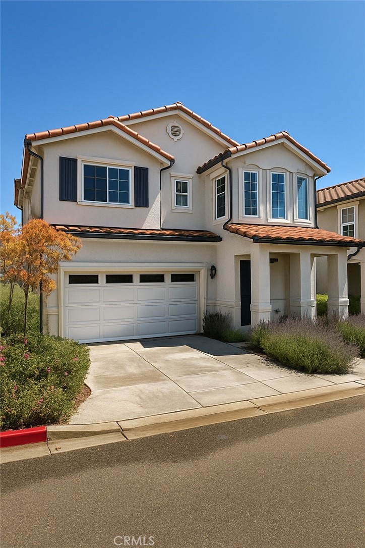 Welcome to 280 Scarlett Circle — a thoughtfully designed two-story home offering comfort, space, and style in a desirable Nipomo neighborhood. This inviting residence features 3 spacious bedrooms and 2.5 bathrooms, including a convenient Jack and Jill layout perfect for family living or guests. Step inside and enjoy the open-concept first floor, where the bright and airy kitchen flows effortlessly into a large living room and welcoming dining area — ideal for hosting gatherings or relaxing at home. Upstairs, the private primary suite offers a peaceful retreat, complete with soaring vaulted ceilings, a generous walk-in closet, and a dual vanity en-suite bath designed for two. Additional highlights include a well-placed upstairs laundry room for everyday ease, an attached garage, and low-maintenance outdoor space. Whether you're a first-time buyer, growing family, or looking for a comfortable place to settle in, this home checks all the boxes. Don’t miss your chance to own this charming home in one of Nipomo’s most convenient locations — close to parks, schools, shops, and the Central Coast’s scenic beauty.