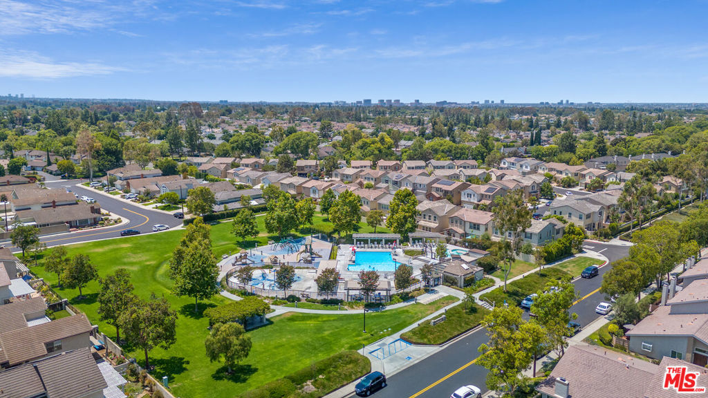 Irvine Perfection! Welcome to 46 Eagle Point, a beautifully remodeled expansive three-bedroom, two-bath first floor condo nestled in one of Irvine's most coveted neighborhoods. From the moment you pass the charming front garden and step inside, you're welcomed by an abundance of natural light and thoughtfully curated spaces that instantly feel like home. Designed for effortless living, the open floor plan flows from a sunlit living area to an updated chef's kitchen featuring custom cabinetry and countertops, new stainless steel appliances and a dining area perfect for everyday meals or special gatherings. Just beyond the sliding doors, a generous private patio with lush landscaping and a trellis invites al fresco dining and outdoor relaxation. The serene primary suite offers a spa-like experience with dual vanities and a shower over tub. Two additional spacious bedrooms provide room for guests, work or creative space. The updated hall bath includes an open entry shower and the convenience of an in-unit laundry room adds to the ease of daily living. Luxury vinyl flooring, designer lighting, crown molding and high-end finishes throughout elevate the space, while the well-maintained community features exceptional amenities including a sparkling pool, spa, sports courts, and nearby parks. Located close to top-rated schools, IVC College, UCI and a few blocks to the serene North Lake, trendy shops and vibrant dining options, offering the perfect blend of comfort, style, and convenience. Whether you're looking for your forever residence or a low-maintenance retreat, this is a rare opportunity to own a slice of Irvine living at its best. This property is ready to welcome you!