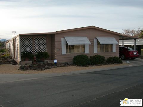 Photo of 7501 Palm Avenue #113, Yucca Valley, CA 92284 (MLS # 25580853PS)