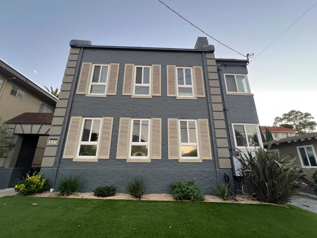 Discover a rare opportunity to live in a quiet, ground-level 1-bedroom unit in a beautifully restored historical building that combines timeless charm with modern convenience. This intimate building features only 4 units, 2 per floor, offering enhanced privacy and a serene atmosphere. The fully renovated unit boasts fresh paint, all-new LED modern lightings, updated kitchen, modern upscale bathroom (new toilet, new LED Mirror) , window blinds, insulated ceilings and walls for added comfort, and hardwood floor throughout, creating a bright, inviting, and energy-efficient living space. Perfectly situated just a block away from a vibrant neighborhood filled with restaurants, cafes, salons, banks, and pharmacies, this location ensures everything you need is within easy reach. Commuters will appreciate the short 10-minute walk to the Caltrain station and the quick 5-minute drive to downtown Burlingame, making travel effortless. Additional amenities include one dedicated parking space, and a conveniently located coin-operated laundry area right up to the unit, providing practicality and ease. The building maintains a smoke-free environment and enforces a strict no-pets policy, one month deposit with great score credit. Rent includes Water, Sewer and Trash.