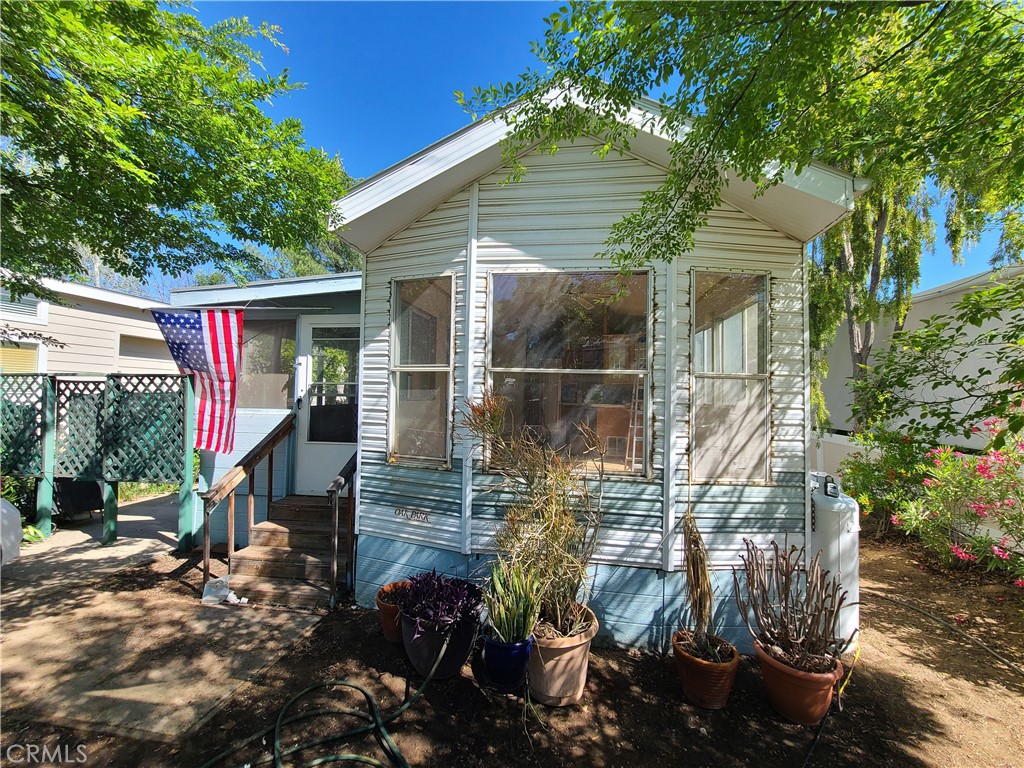 Welcome to Meadowbrook RV Park, Home of One of Lowest Space Rents in the County! This 55+ Membership Community Offers a Fishing Pond, Community Center, Laundry Room, Shower Room, and Many Senior Activities. This home is Ready for a New Owner to Make it their Own, this Home sits on the Perfect Lot that backs up to a Beautiful Green Belt with Plenty of Trees Great for Walks and Shade. Unique Features Include a Patio, a Shed, Plenty of Trees, and Private Setting. Don't miss out on this Great Opportunity!