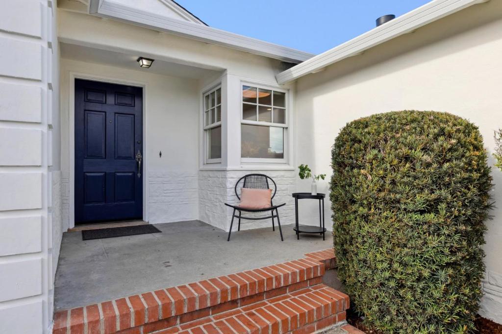 Beautifully updated westside San Mateo home featuring 3 bedrooms, 2 bathrooms, and a seamless blend of charm and modern comfort. The primary suite offers a tastefully updated en-suite bath, while the stylish hall bath serves the additional bedrooms with ease. Gleaming hardwood floors flow throughout the open, light-filled living spaces, creating an inviting atmosphere in the large living room dining room area. The kitchen is the heart of the home, showcasing stainless steel appliances, ample storage, and an eat-in areaperfect for casual meals or entertaining. With a great floor plan and upgrades thru out- the home is move in ready! Additional features include a dedicated laundry room, ample closets and storage, as well as an attached two-car garage, new roof and water heater! Step outside to enjoy a private, beautifully landscaped yard with multiple areas for relaxation and entertaining. The highlight is an incredible lemon tree, offering both charm and fresh fruit to enjoy year-round. Located in one of San Mateos most desirable neighborhoods, this home is close to schools, parks, shopping, dining, and transportationoffering both community and convenience. A rare opportunity to own a home that truly has it all!