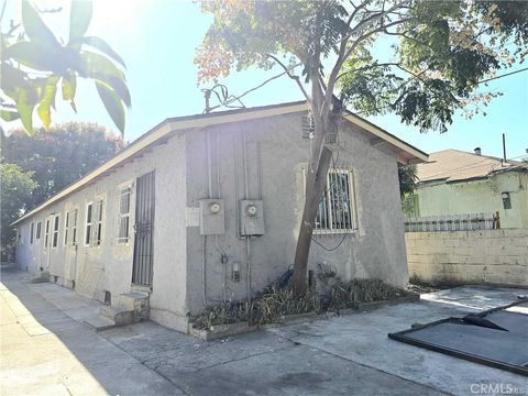 Photo of 1468 E 107th Street #1/2, Los Angeles, CA 90002 (MLS # DW26040940)