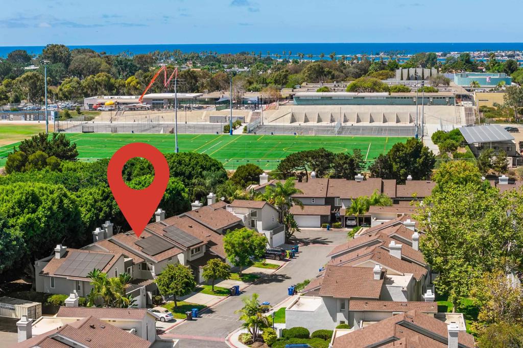 Welcome to 4021 Caminito Dehesa, located in the highly desirable Loma Portal neighborhood within the resort-style Park Point Loma community. This stunning home features the community’s largest floor plan and has been thoughtfully upgraded with new flooring, fresh paint, a modernized kitchen, and updated bathrooms. Inside, you’ll find a spacious layout with large bedrooms and soaring vaulted ceilings. The attached two-car garage offers direct access, a full-size washer and dryer, and plenty of storage space. Comfort is ensured year-round with central heating, air conditioning, and the efficiency of a photovoltaic solar system with battery storage. Step outside and enjoy beautifully maintained mature trees and landscaping, along with access to exceptional community amenities. Park Point Loma offers three sparkling pools—including a lap pool—plus a spa, BBQ area, basketball court, and a pool pavilion. Just across the street, you’ll find a well-kept community park, perfect for relaxing or play. This prime location places you minutes from San Diego’s best beaches, Sunset Cliffs, Rosecrans, and Midway for dining and shopping. Quick access to the 8 and 5 freeways makes it easy to reach downtown, the airport, and everything that makes San Diego America’s Finest City—all while being in close proximity to excellent schools. Don’t miss your opportunity to own this spectacular home in one of San Diego’s most sought-after neighborhoods!