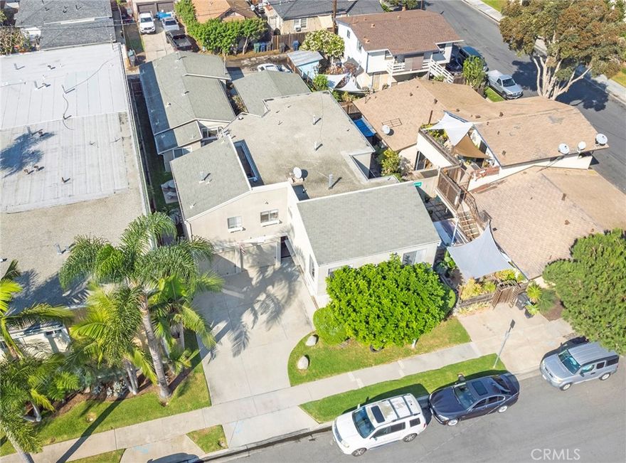 A rare, well maintained 5 unit multi-family property located near downtown Huntington Beach. This property is currently occupied with great tenants, 4 of which are on leases and one month to month. There are 3 units with 2 bedrooms, 1 unit that has 3 bedrooms and 1 studio apt. There are 4 single car garages to the front of the building and a separate 2 car garage located to the rear of the property. Each unit is separately metered and the entire property is professionaly managed by a property managment company. However, this property can easily be maintained by an owner/manager and would increase your cap rate. The property is conveniently located just a short distance to downtown, the pier and the beach.