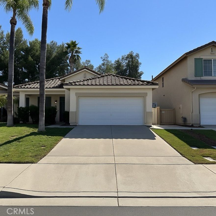 This charming single story home in the desirable Paloma Del Sol community in Temecula is available now for LEASE!. With 3 bedrooms and 2 bathrooms, it features a spacious and functional layout that’s ideal for modern living. As you enter inside, you're greeted by vaulted ceilings and a neutral paint scheme that enhances the open and airy feel of the main areas. The upgraded flooring throughout the home adds a touch of elegance, while the open-concept floor plan promotes seamless flow from room to room. The family room is the heart of the home, offering a cozy fireplace and built-in shelving. This space opens up to the dining area and kitchen. The kitchen is beautifully updated with quartz countertops, white shaker-style cabinets, and stainless steel appliances! Down the hall, you’ll find a convenient laundry room equipped with a washer and dryer, direct garage access, and the three bedrooms. The primary bedroom is a peaceful retreat with high ceilings, a ceiling fan, and private access to the backyard. The ensuite bathroom offers a shower tub combo, dual sinks, and a walk-in close. Outside, the backyard boasts a covered patio perfect for outdoor dining and relaxation, a yard offering plenty of space for activities, side yards, and the added bonus of no rear neighbors for extra privacy. The backyard will be cleaned up for your enjoyment before moving in. Living in Paloma Del Sol means access to fantastic community amenities, including a pool and spa, playgrounds, BBQ/picnic areas, walking trails, tennis courts, and basketball courts. This home is more than just a place to live; it’s a place to thrive! Dont miss your opportunity, schedule a showing today!